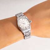vintage rolex mid-size ww, wrist shot close up