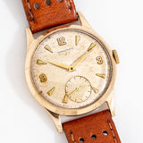 vintage longines yellow gold ww, on its back