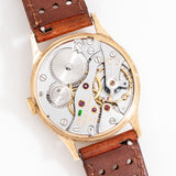 vintage longines yellow gold ww, movement shot