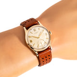 vintage longines yellow gold ww, wrist shot close up