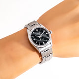 vintage rolex oyster perpetual black dial ww, wrist shot close up