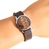 vintage Universal Geneve wood dial, wrist shot close up